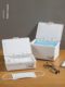 Imported mask storage box, flip debris box, four-wheel drive car package box, desktop cosmetics, laundry bead box