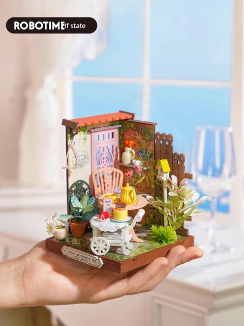 The seaside restaurant is miniaturely reduced in size and a small house. Diy wooden cottage. Handmade gifts. Artistic woman