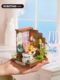 The seaside restaurant is miniaturely reduced in size and a small house. Diy wooden cottage. Handmade gifts. Artistic woman