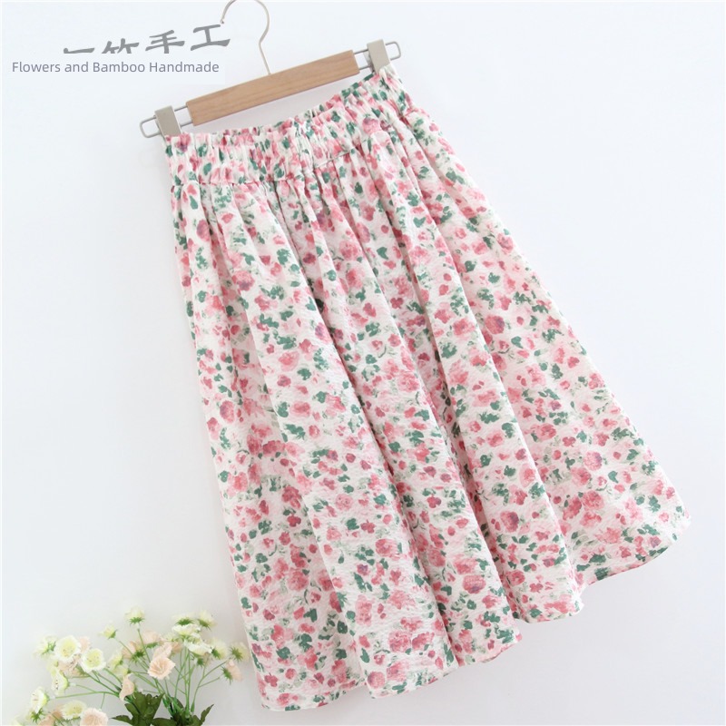 Pink Cotton and hemp skirt Women's middle 2023 Spring and summer Umbrella skirt Gentle wind A word Broken flower Short skirt 60cm