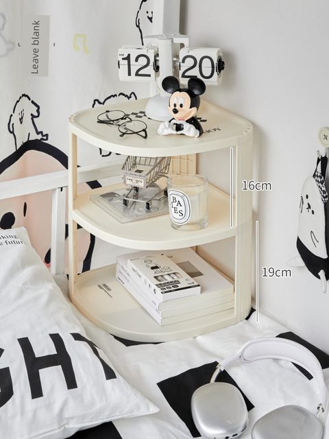 The dormitory bed rack corner bedside storage cabinet is fully included in the bed curtain storage box. The object artifact is laid on the bed