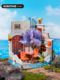 The seaside restaurant is miniaturely reduced in size and a small house. Diy wooden cottage. Handmade gifts. Artistic woman