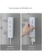 The wall-mounted socket plug-in is not drilled and self-adhesive wire management fixing wall-mounted wire storage device